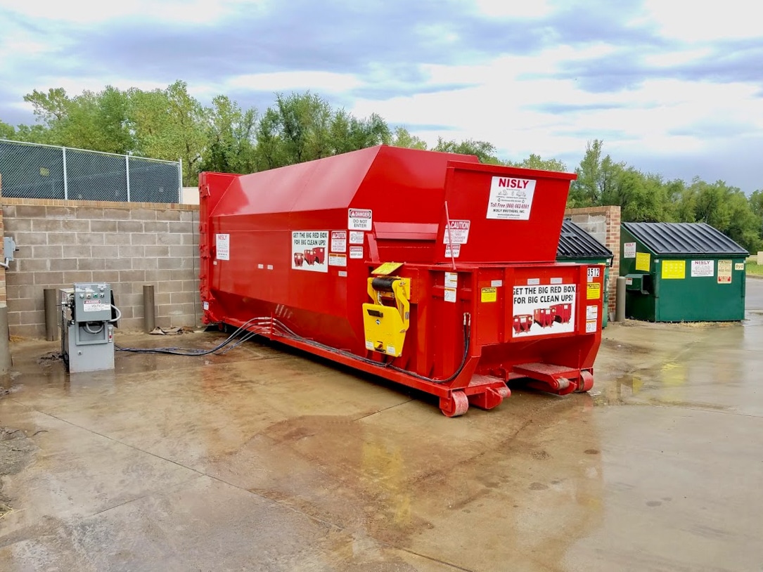 commercial trash compactor for commercial trash services in central kansas in harvey county