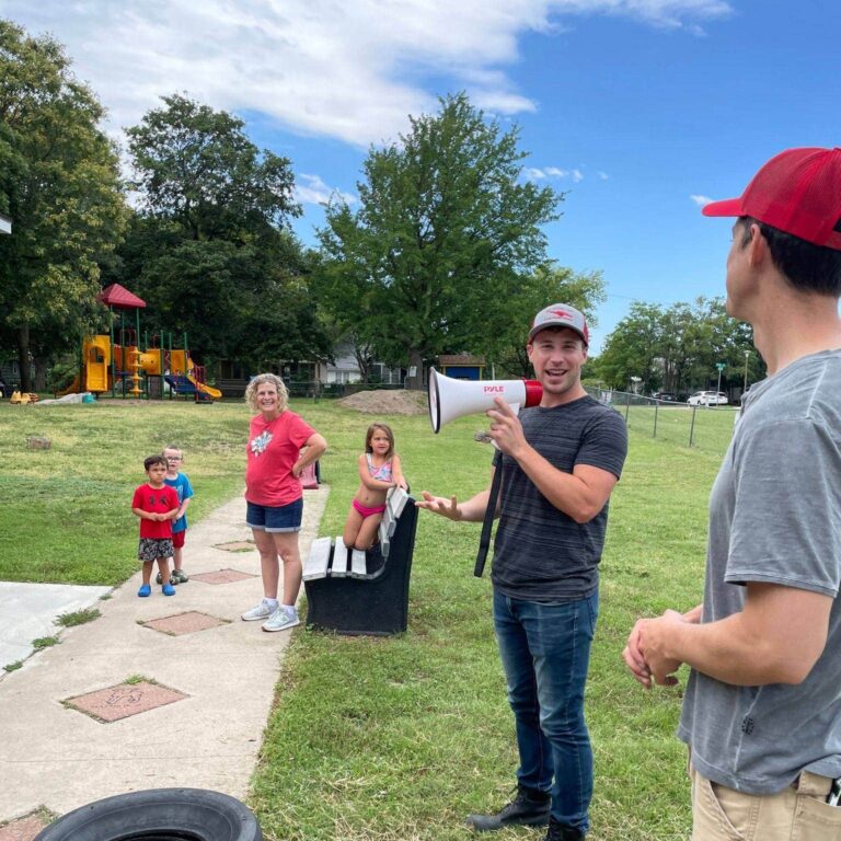 Nisly employees teaching kids about trash trucks